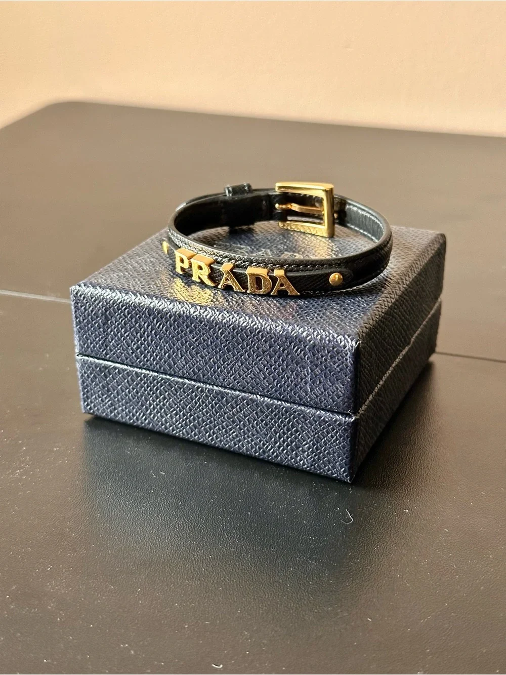 Prada Black Leather Bracelet with Gold Logo and Buckle